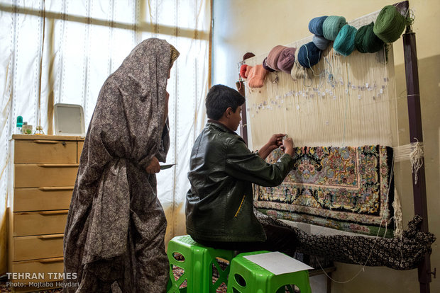 Iranian female carpet weaver works her way through entrepreneurship   