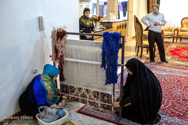 Iranian female carpet weaver works her way through entrepreneurship   
