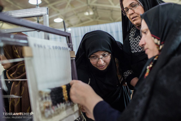 Iranian female carpet weaver works her way through entrepreneurship   