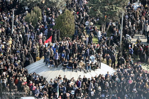 Packed crowds attend funeral procession of top military commander Qasem Soleimani in Tehran 