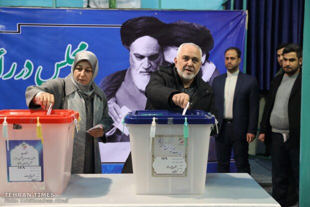 Top Iranian officials cast votes in early hours of election day