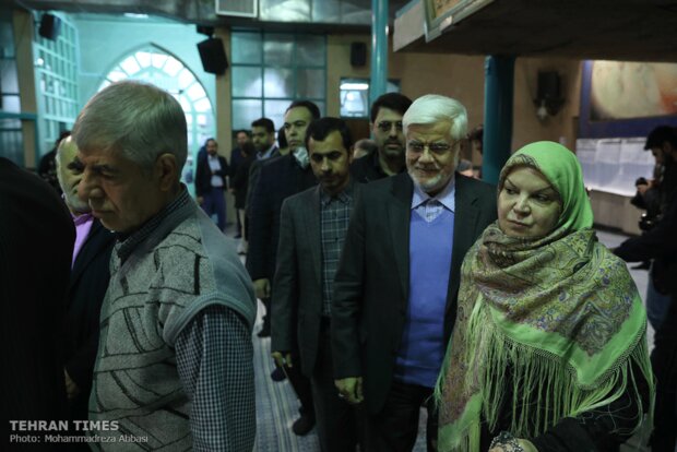 Top Iranian officials cast votes in early hours of election day