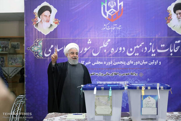 Top Iranian officials cast votes in early hours of election day