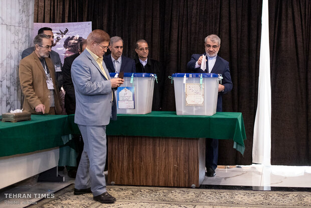 Top Iranian officials cast votes in early hours of election day