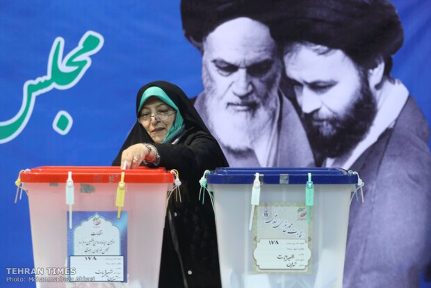 Top Iranian officials cast votes in early hours of election day