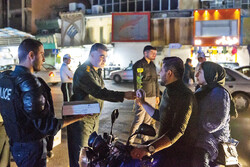Police forces offer flowers to Tehrani citizens