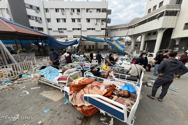 Some Palestinians injured are seen at the al-Shifa Hospital which housed thousands of injured and displaced people. [Fadi Alwhidi/Anadolu]

