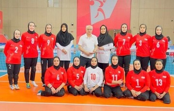 women sitting volleyball