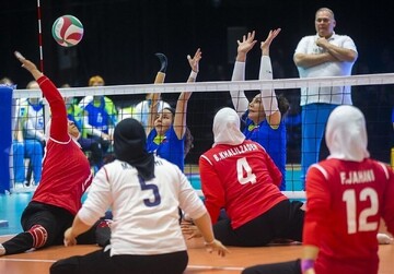 women sitting volleyball