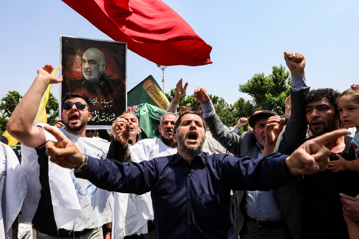 Israelis in shelters, Iranians in the streets