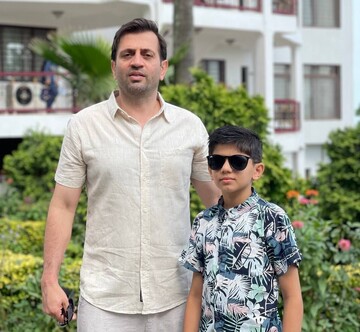 Reza Amini and his young son, Amir-Ali Amini