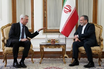 Iranian Foreign Minister Abbas Araghchi (R) meets with United Nations High Commissioner for Refugees Filippo Grandi in Tehran, on July 22, 2025.