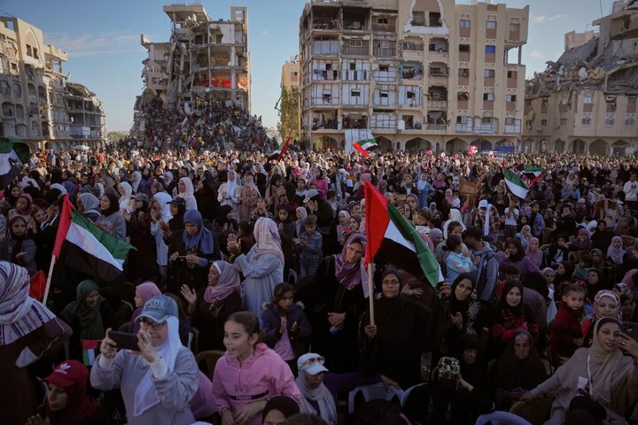 Palestinians celebrate as young couples attend mass wedding