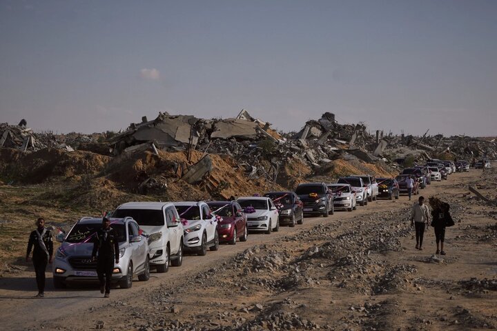 Palestinians celebrate as young couples attend mass wedding