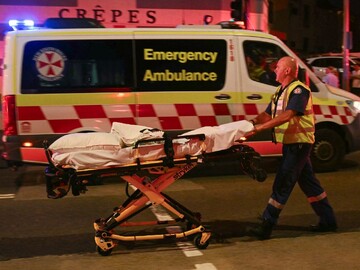Emergency workers at the scene of the shooting incident at Bondi Beach in Sydney, Australia, on Monday, December 15, 2025.