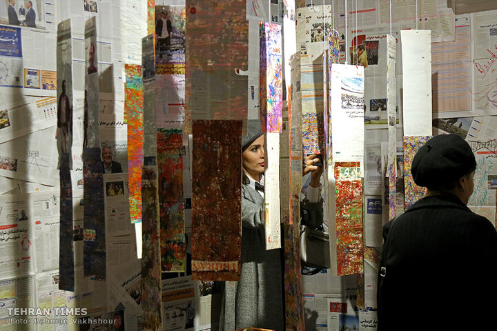 Painting on the news: Iranian artist turns newspapers into art