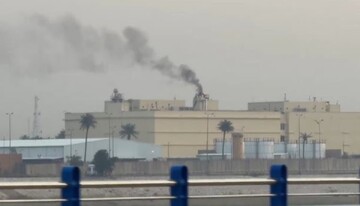A missile struck a helipad inside the U.S. embassy compound in Baghdad. Associated Press footage showed a column of smoke rising Saturday morning over the embassy compound. (AP video shot by: Ali Jabar)
