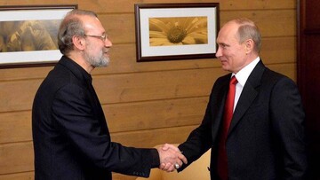Dr. Ali Larijani, the martyred secretary of the Islamic Republic's Supreme National Security Council (SNSC) (R) and Russian President Vladimir Putin