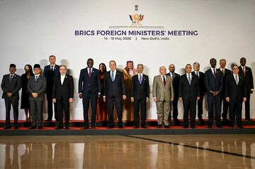 Iranian FM Abbas Araghchi poses with fellow BRICS diplomats for a family photo at Bharat Mandapam in New Delhi, India, May 14, 2026.