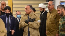 Iraqi Prime Minister Mustafa al-Kadhimi wearing the uniform of Popular Mobilization Units (PMU) during a visit to the resistance group's command center in Baghdad on May 16, 2020.