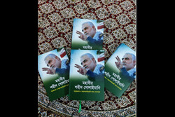 Copies of Bangladeshi publisher Saeed Bari’s book “Martyr Qassem Soleimani: Hero of Struggle against Terrorism and Colonialism”.