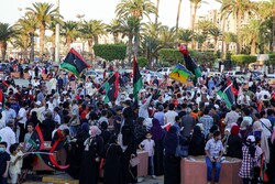  Celebrating with Libyan national flags in Tripoli in early June after fighters loyal to the U.N.-backed government captured the town of Tarhuna from rival forces loyal to the commander Khalifa Hifter. (Photo: Agence France-Presse — Getty Images)