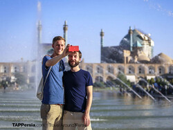 Foreign travelers take a selfie during the visits to the UNESCO-registered Imam Square in Isfahan, central Iran.