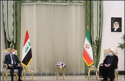 Iranian president Hassan Rouhani - Iraqi Prime Minister Mustafa al-Kadhimi