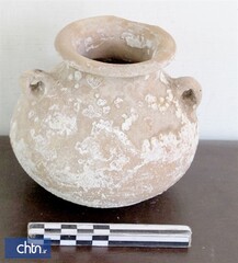 pre-historical clay jug