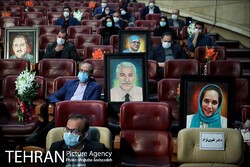 Photos of martyred medical staff during a ceremony held for commemoration of National Doctor's Day in Tehran on August 20, 2020.