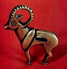  An Iranian bronze padlock in the shape of a ram
