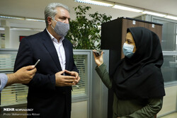 Cultural Heritage, Tourism and Handicrafts Minister Ali-Asghar Mounesan (L) talks to a correspondent during his visit to the Mehr news agency on October 3, 2020. 