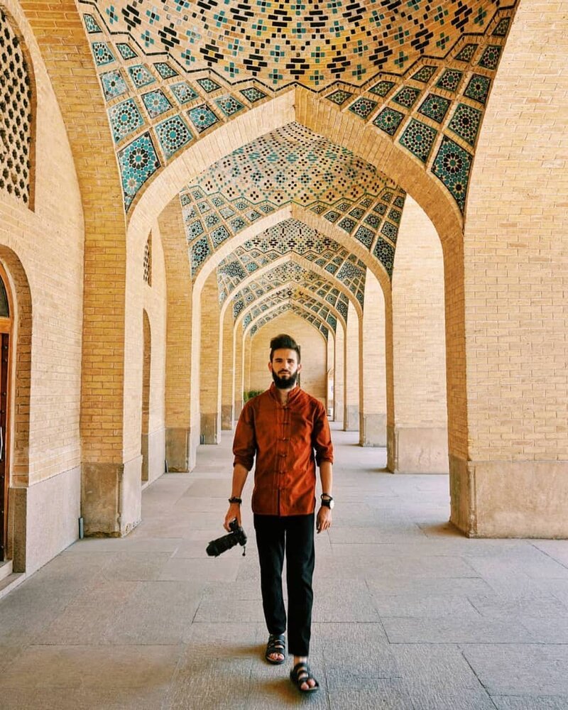 Turkish photographer Berke Arakli poses for a photo during his visit to Nasir al-Molk Mosque in Shiraz in August 2019