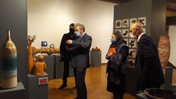 Cypriot Ambassador Petros T. Nacouzis (2nd L) and a number of the organizers visit the 11th National Biennial of Contemporary Iranian Ceramic Art at Tehran’s Niavaran Cultural Center on November 19, 2