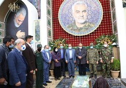Organizers pay tribute to Martyr Qassem Soleimani during the opening ceremony of the 16th Resistance International Film Festival at his grave in Kerman on November 21, 2020. 
