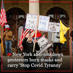 New York anti-lockdown protesters burn masks and carry "Stop Covid Tyranny"