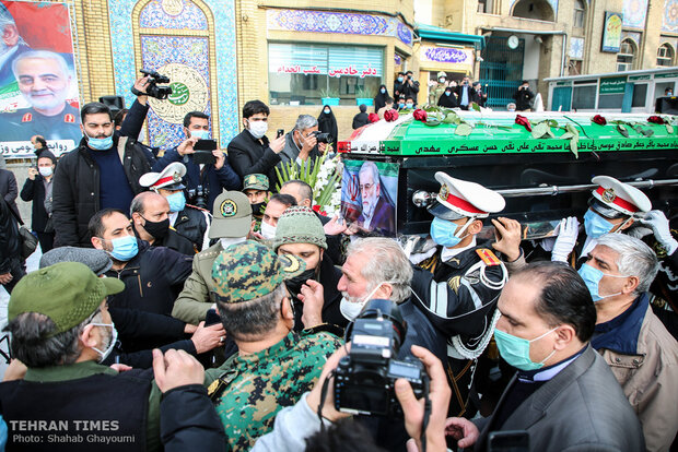 Martyred nuclear scientist Mohsen Fakhrizadeh laid to rest in Tehran mosque 