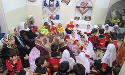 Children along with grandmothers celebrate Yald Night at a kindergarten in the town of Fereidunshahr, Isfahan Province, on December 20, 2016. (Ehsan Jadidi/file photo)  