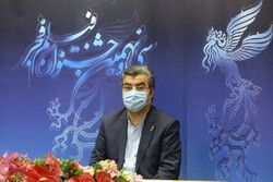 President of the Fajr Film Festival, Mohammad-Mehdi Tabatabainejad, attends a press conference in Tehran on December 5, 2020 to brief the media about the 39th edition of Iran’s major film event.