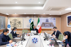 TCCIMA Head Masoud Khansari (center) attends an online Iran-Pakistan business forum on Tuesday.