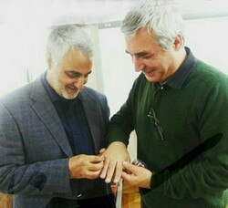 Commander Qassem Soleimani presents filmmaker Ebrahim Hatamikia with a ring during an undated meeting.  