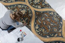 A 10-metre-long painted reproduction of the tiled dome interior of Mosque of Sheikh Lutfollah, Isfahan, in preparation for the Epic Iran show. Photograph: Peter Kelleher