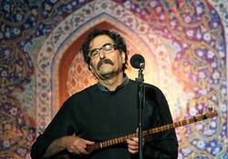 This file photo shows Iranian vocalist Shahram Nazeri performing in a concert.