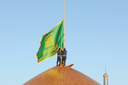 Imam Reza holy shrine’s flag replaced