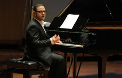 This file photo shows Iranian pianist Puyam Azadeh giving a recital. 