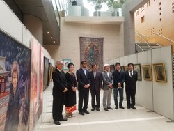 Iranian cultural attache Hossein Divsalar (3rd L) and Japanese artist visit the Iran-Japan Cultural Exchange Exhibition in Tokyo on July 1, 2021.