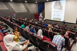 Gorgan-based Kazakh people attend a screening of the documentary “Wot Bassey” about their customs in Iran in the northeastern Iranian city of Gorgan on July 3, 2021. 