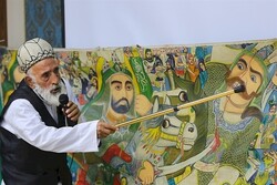 This file photo shows Morshed Mahmud Daddah performing a pardeh-khani show. 