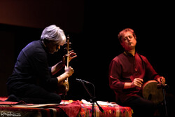 This file photo shows Kayhan Kalhor (L) and Behnam Samani performing a concert.