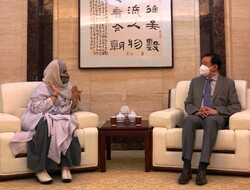 This undated photo shows Iranian director Narges Abyar in her meeting with Chinese Ambassador Chang Hua.
